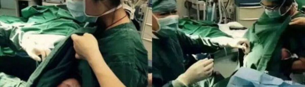 En un hospital chino una enfermera le da el pecho a un bebe mientras lo intervienen